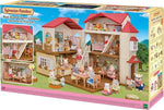 Sylvanian Families Rdeča streha podeželska hiša s pohištvom in posebnimi oblekami